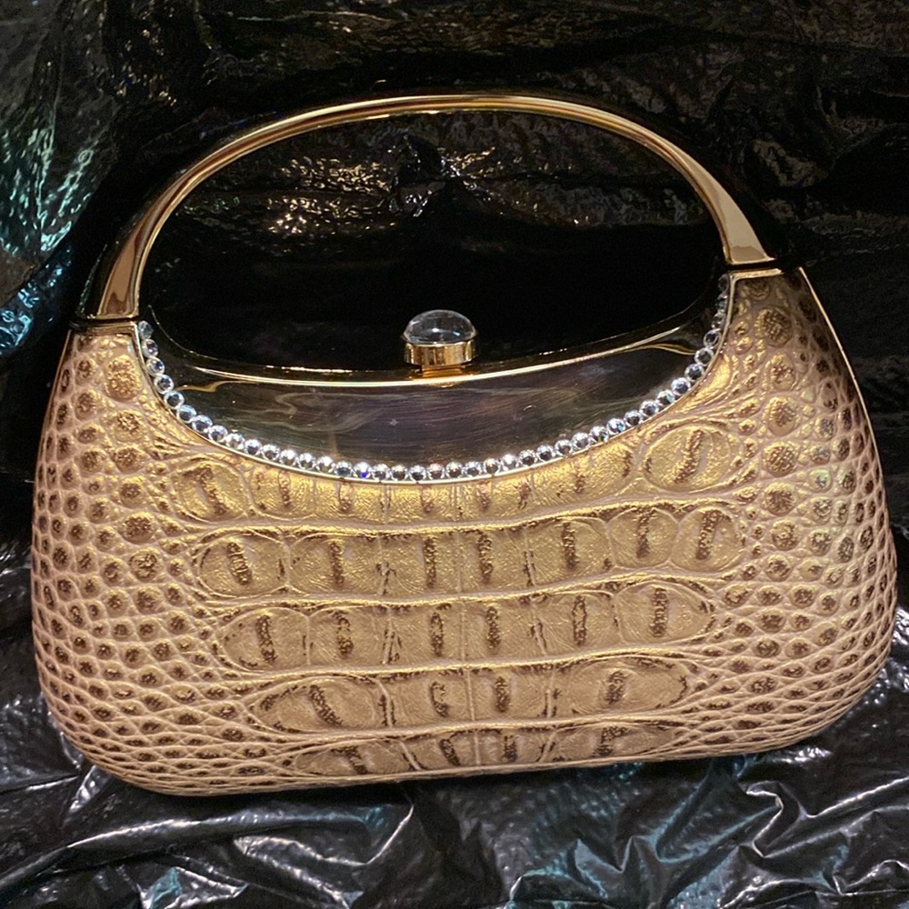 NWT gold faux animal print with rhinestone accents evening bag.